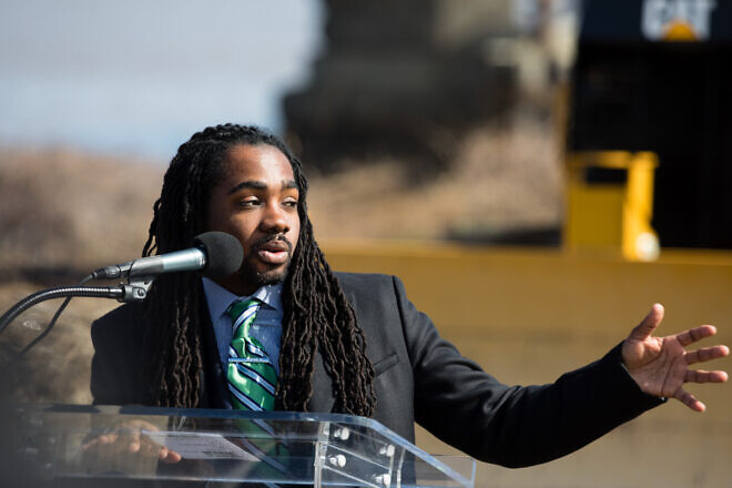 Ward 8 council member Trayon White speaks during a groundbreaking ceremony for the new Jefferson Douglass Bridge over the Anacostia River in Southeast Washington, D.C., on Feb. 13, 2018. Credit: Will Parson/Chesapeake Bay Program, Creative Commons.
