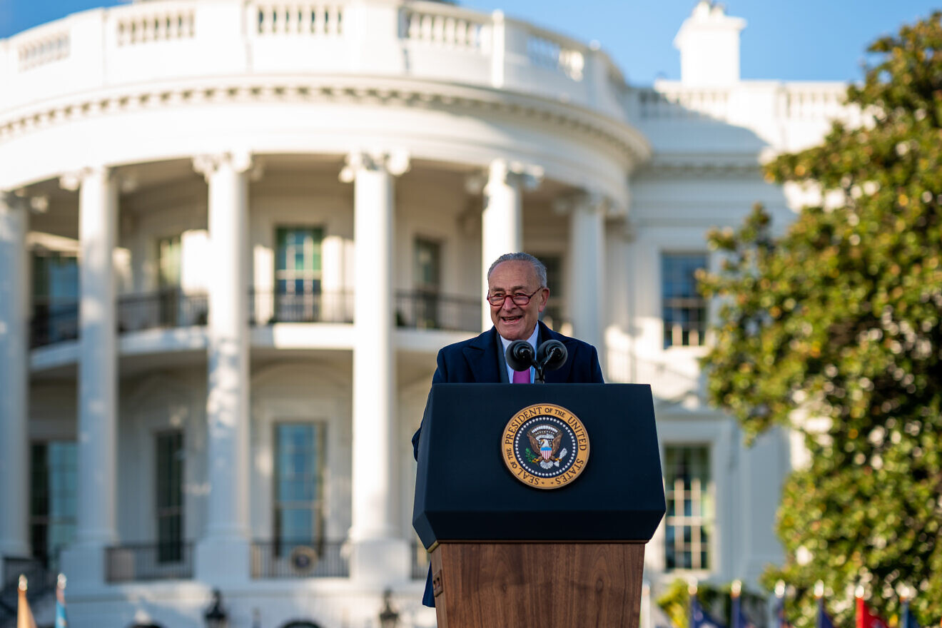 Senate Majority Leader Chuck Schumer (D-N.Y.) gives remarks before President Joe Biden signs the Infrastructure Investment and Jobs Act on the South Lawn of the White House, Nov. 15, 2021. Credit: Cameron Smith/White House.