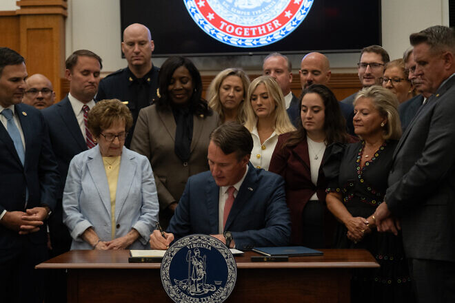 Virginia Gov. Glenn Youngkin signs identical state House and Senate bills HB 18 and SB 7 that protect against discrimination based on ethnicity on Aug. 28, 2024. Credit: Austin Stevens/Office of Gov. Glenn Youngkin.