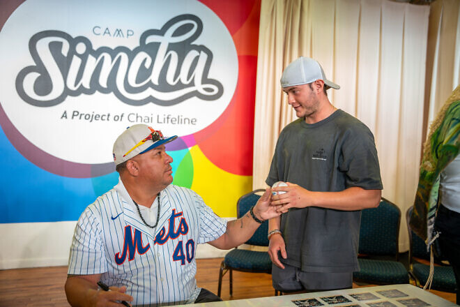Bartolo Colón, a professional baseball player and former Major League Baseball pitcher, visits Camp Simcha. Credit: Courtesy.