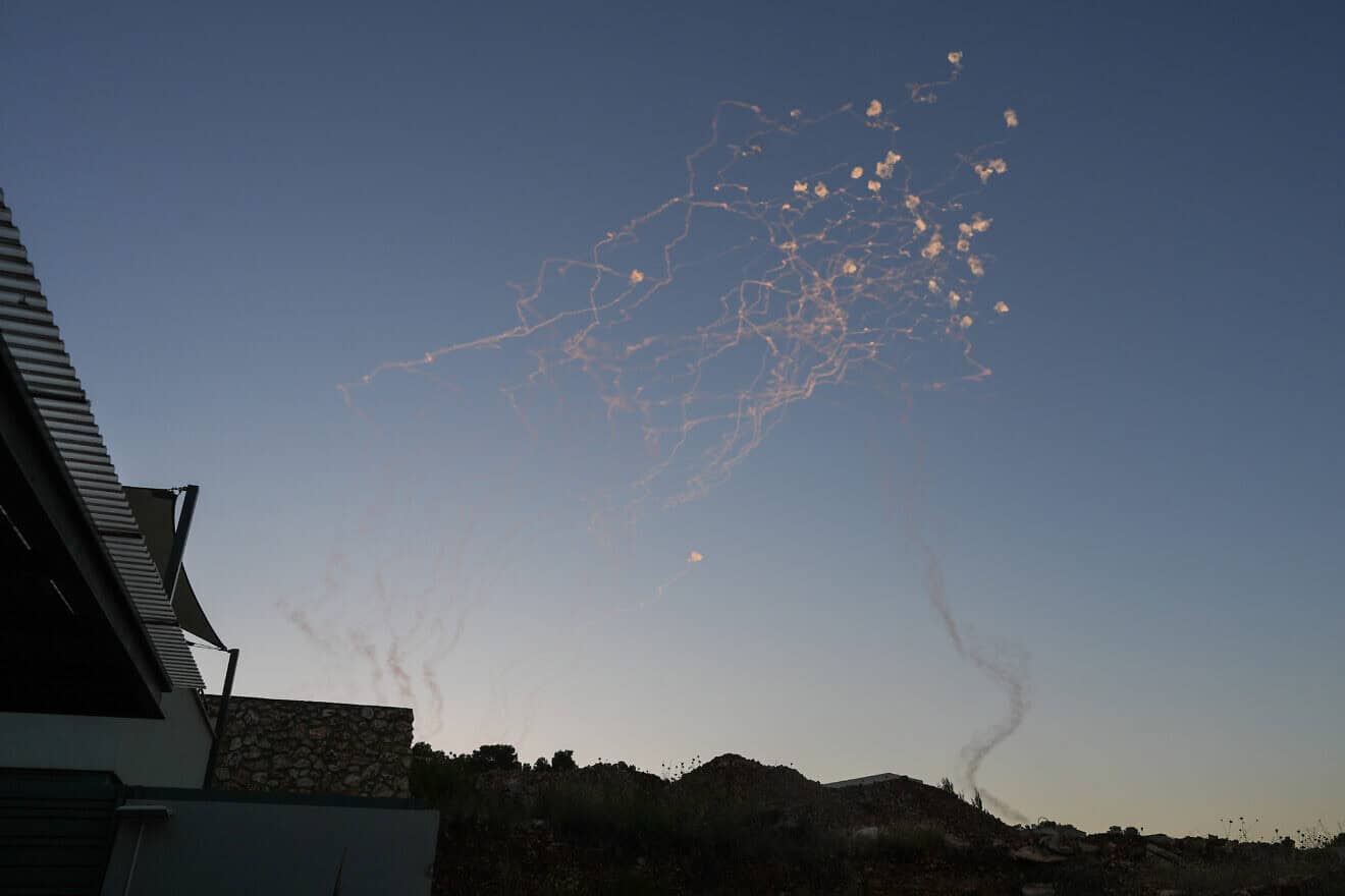 Israeli air-defense systems fire interceptors at rockets launched by Hezbollah in Lebanon, seen from the northern Israeli town of Safed on June 27, 2024. Photo by Ayal Margolin/Flash90.