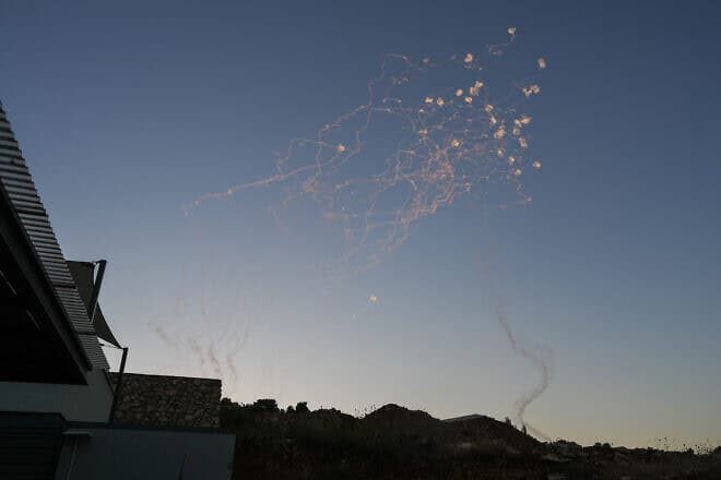 Israeli air-defense systems fire interceptors at rockets launched by Hezbollah in Lebanon, seen from the northern Israeli town of Safed on June 27, 2024. Photo by Ayal Margolin/Flash90.