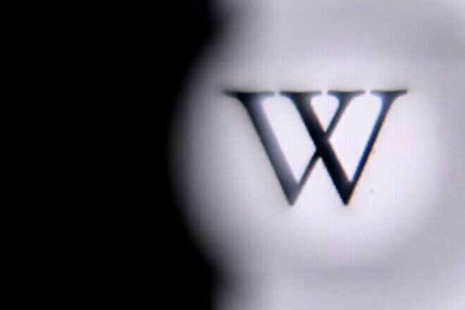 The Wikipedia logo on a tablet screen. Photo by Kirill Kudryatsev/AFP via Getty Images.
