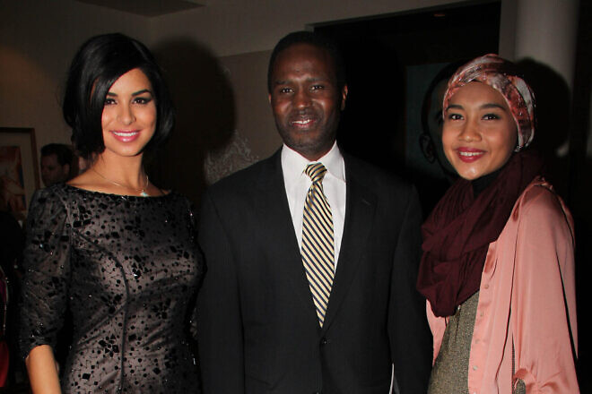 Miss USA Rima Fakih, Mohammed Elsanousi and singer-songwriter Yuna attend a reception celebrating achievements in Muslim-Jewish relations in New York City on March 29, 2011. Photo by Johnny Nunez/WireImage via Getty Images.