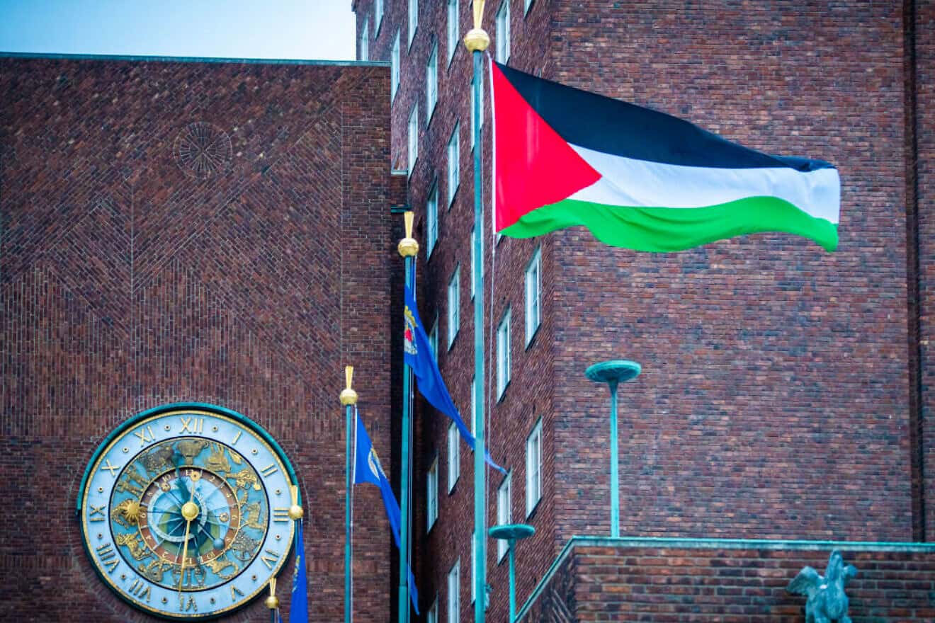 A PLO flag flutters in the wind after it was raised in the courtyard outside City Hall in Oslo on Nov. 29, 2023. Photo by Ole Berg-Rusten/NTB/AFP via Getty Images.