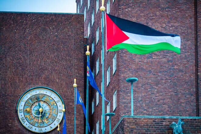 A PLO flag flutters in the wind after it was raised in the courtyard outside City Hall in Oslo on Nov. 29, 2023. Photo by Ole Berg-Rusten/NTB/AFP via Getty Images.