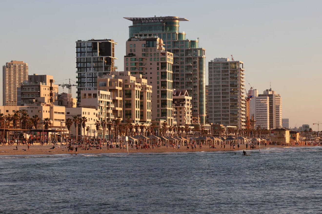 A picture taken on March 5, 2024 shows a view of the skyline of Israel's coastal city of Tel Aviv during the sunset. Photo by Jack Guez/AFP via Getty Images.