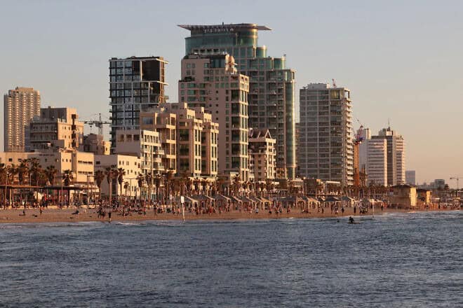 A picture taken on March 5, 2024 shows a view of the skyline of Israel's coastal city of Tel Aviv during the sunset. Photo by Jack Guez/AFP via Getty Images.
