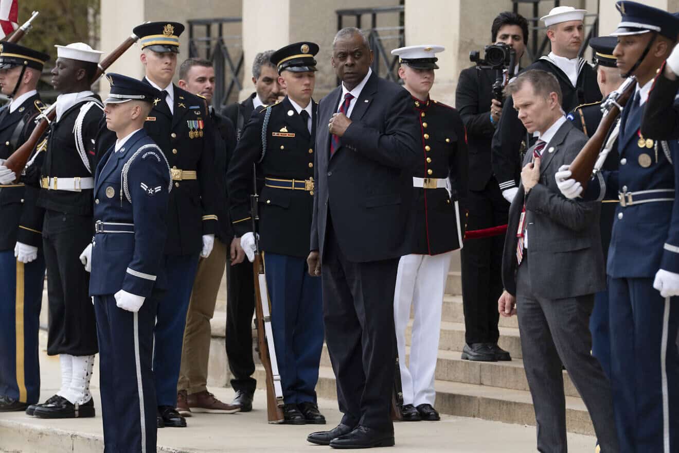 U.S. Defense Secretary Lloyd Austin (center) arrives to welcome Iraqi Prime Minister Mohammed Shia al-Sudani to the Pentagon on April 15, 2024, in Washington, D.C. Photo by Chris Kleponis/AFP via Getty Images.