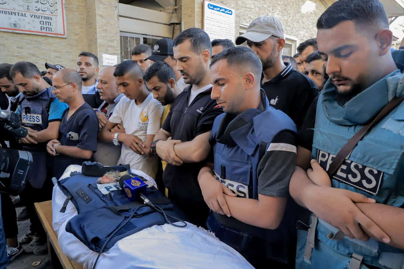 Mourners surround the body of Hamas terrorist and “Al Jazeera” reporter Ismail al-Ghoul, July 31, 2024. Photo by Abood Abusalama/Middle East Images via AFP.