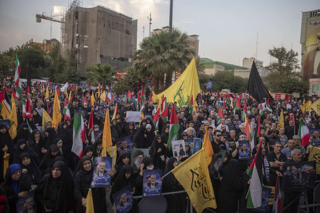 Hundreds of Iranians take part in a protest against the killing of Ismail Haniyeh, the political head of Hamas, in Palestine Square in Tehran, July 31, 2024. Photo by Majid Saeedi/Getty Images.