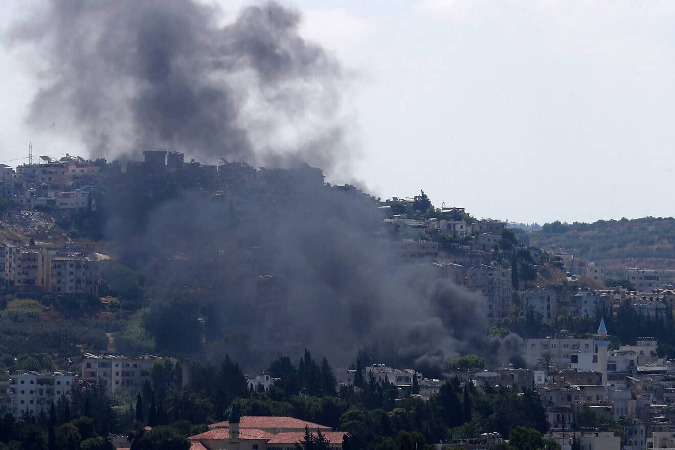 Smoke billows after an Israeli strike on a car in Lebanon's southern city of Sidon on Aug. 21, 2024. The strike killed a Fatah official, said a leader from the Palestinian group and a security source, marking the first such attack reported on Fatah in over 10 months of cross-border clashes. Photo by Mahmoud Zayyat/AFP via Getty Images.