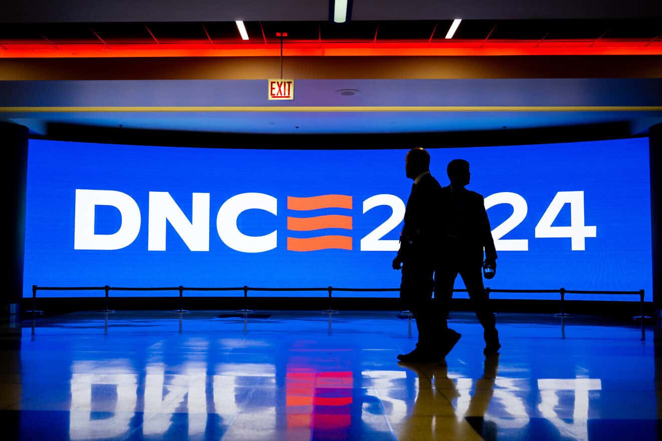 Security walk through hallways at the United Center during preparations ahead of the Democratic National Convention in Chicago on Aug. 18, 2024. Photo by Brandon Bell/Getty Images.