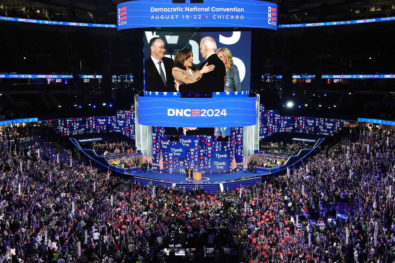 U.S. Vice President Kamala Harris greet U.S. President Joe Biden as first lady Jill Biden and second gentleman Doug Emhoff look on at the end of the first day of the Democratic National Convention at the United Center in Chicago, Aug. 19, 2024. Photo by Andrew Harnik/Getty Images.