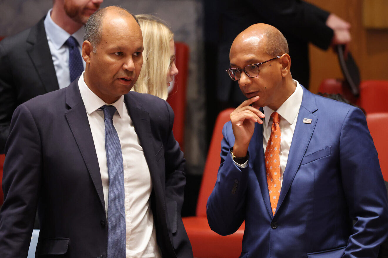 James Kariuki (lefet), U.K. deputy ambassador to the United Nations, and Robert Wood, deputy U.S. ambassador to the global body, speak during a U.N. Security Council meeting on the situation in the Middle East, on Aug. 29, 2024. Photo by Michael M. Santiago/Getty Images.