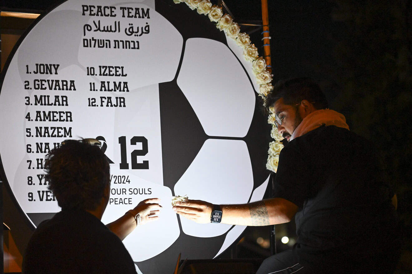 Druze residents at the scene of the deadly missile attack at a soccer field in the northern Israeli village of Majdal Shams, in the Golan Heights, July 31, 2024. Photo by Michael Giladi/Flash90.