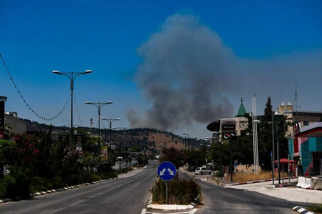 View of a fire in Metula, the Upper Galilee, started by missiles launched from Lebanon, June 18, 2024. Photo by Ayal Margolin/Flash90.