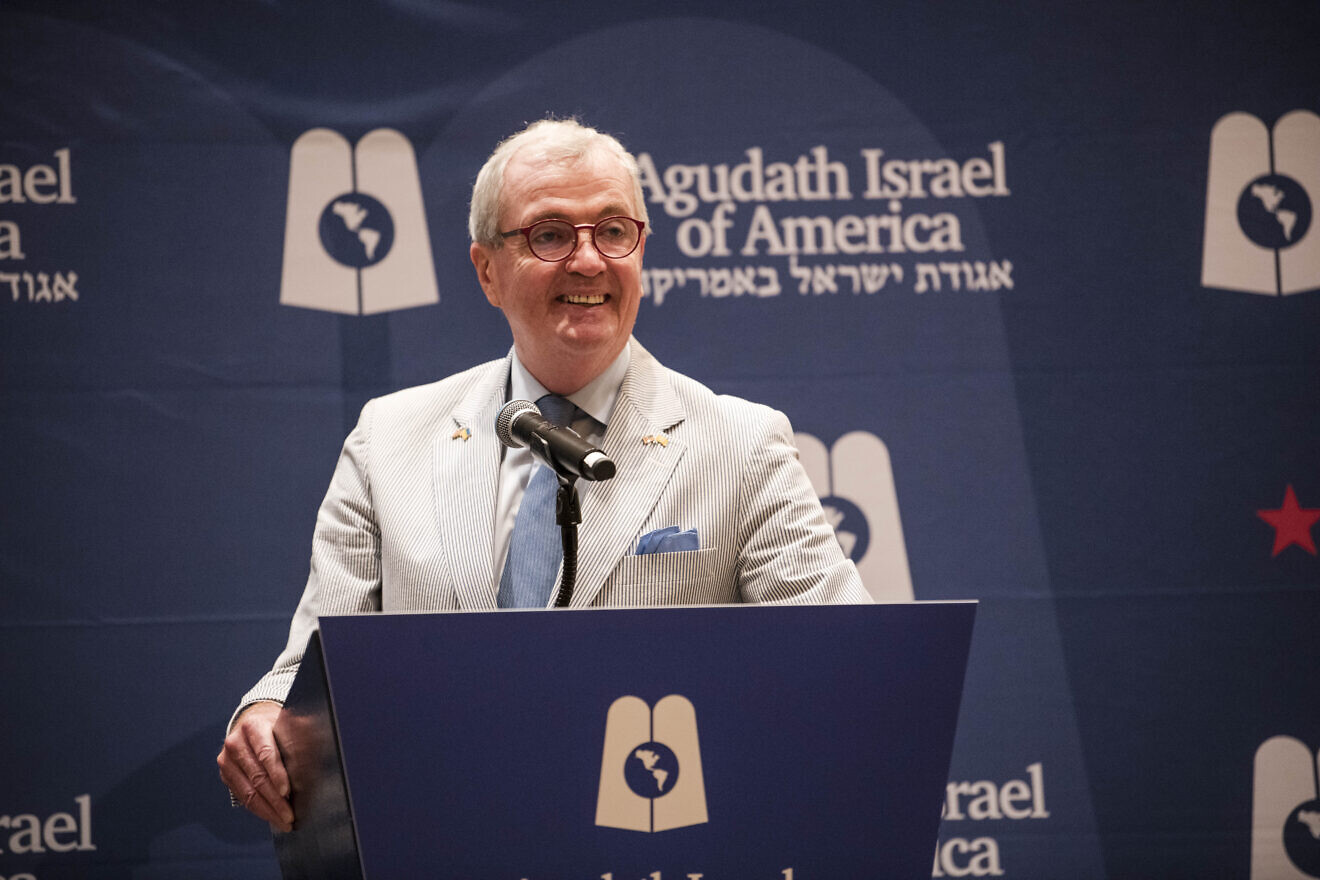 New Jersey Gov. Phil Murphy speaks at an Agudath Israel of America event on the sidelines of the Democratic National Convention in Chicago on Aug. 20, 2024. Credit: Agudah.