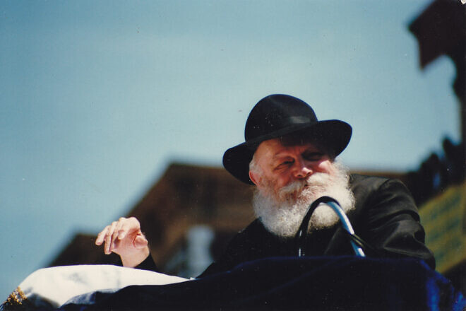 Rabbi Menachem Mendel Schneerson, the Lubavitcher Rebbe, at a Lag B'Omer parade in Brooklyn, N.Y., on May 17, 1987. Credit: Mordecai Baron/Wikipedia.