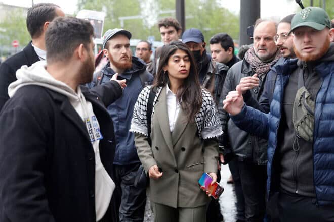 La France Insoumise European Parliament candidate Rima Hassan leaves a rally in Paris on April 30, 2024. Photo by Geoffroy Van der Hasselt/AFP via Getty Images.