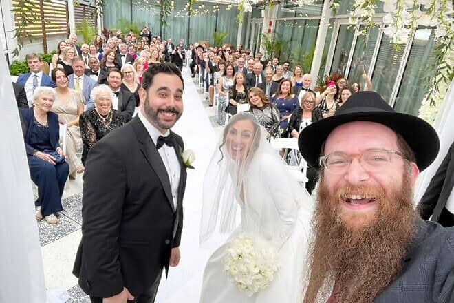 Rabbi Yisroel Bernath at a Jewish wedding. Credit: Courtesy.
