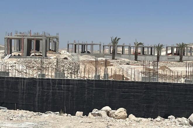 Holiday resort guest houses under construction in a Judean Desert nature reserve under Palestinian Authority control, Aug. 21, 2024. Photo by Josh Hasten.