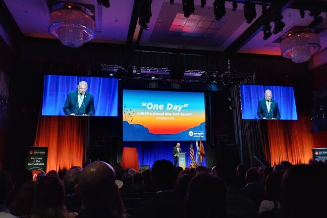 Doug Seserman, CEO of Americans for Ben-Gurion University, addresses the audience at the A4BGU concert benefit, featuring American reggae singer Matisyahu, at the Ziegfeld Ballroom in New York City on Sept. 22, 2024. Photo by Carin M. Smilk.