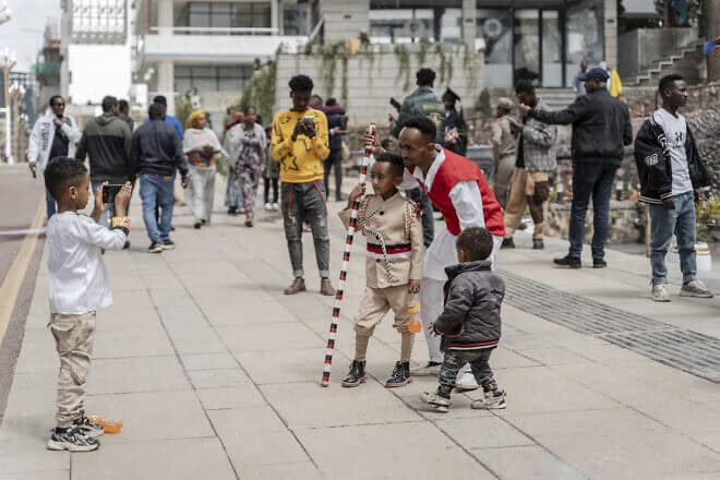 People take photos at a newly-built walkway and bike lane in Addis Ababa, Ethiopia, on July 27, 2024. Photo by Amanuel Sileshi/AFP via Getty Images.