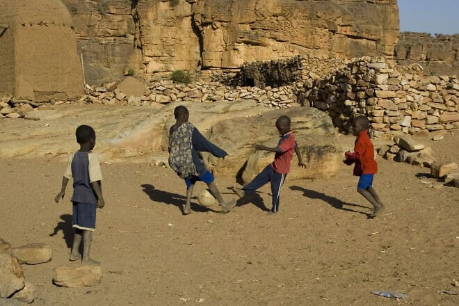 Boys play soccer in Mali, Africe. Credit: Jelle Jansen/Flickr via Wikimedia Commons.
