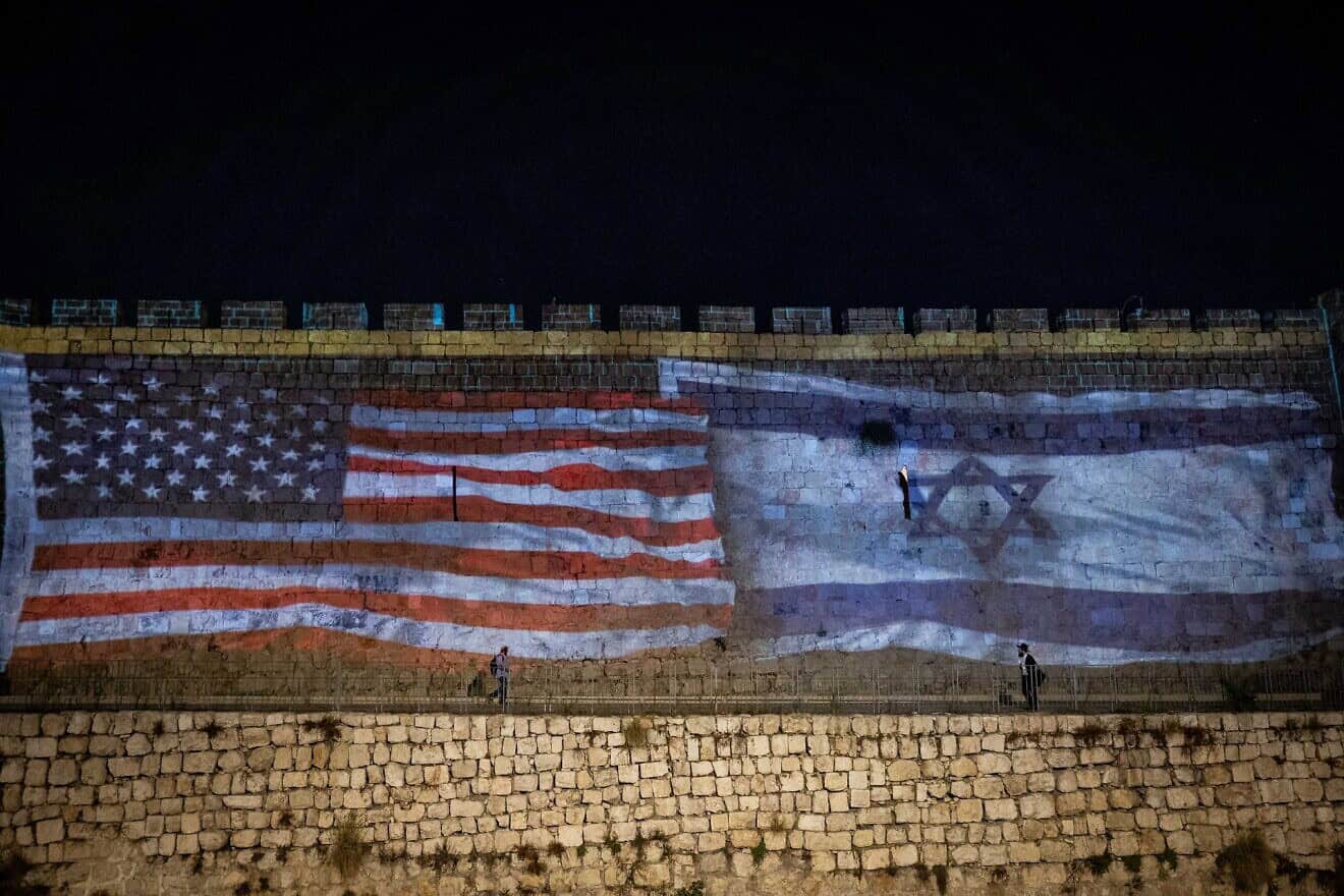 The American and Israeli flags are screened on the walls of Jerusalem's Old City to thank U.S. President Joe Biden for his support for Israel on Oct. 18, 2023. Photo by Yonatan Sindel/Flash90.