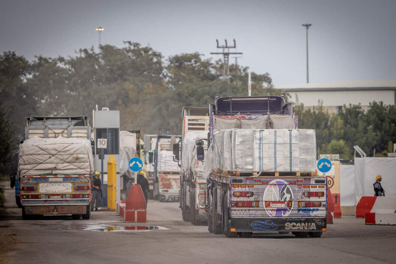 Aid trucks entering the Gaza Strip, at the Kerem Shalom crossing in southern Israel, Jan. 29, 2024. Photo by Chaim Goldberg/Flash90.