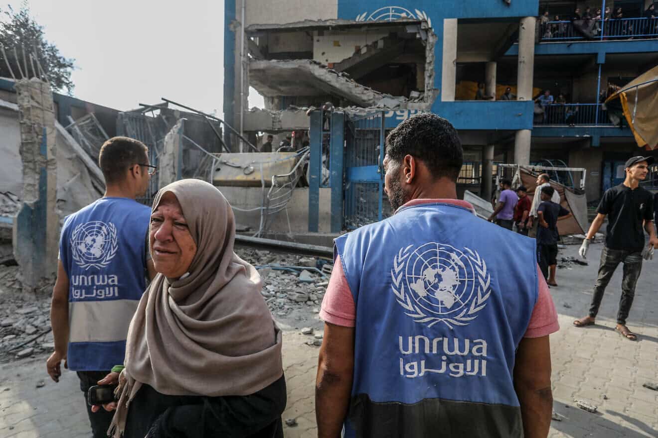 UNRWA officials at the site of an Israeli airstrike in the Nuseirat camp in the central Gaza Strip, July 15, 2024. Photo by Abed Rahim Khatib/Flash90.