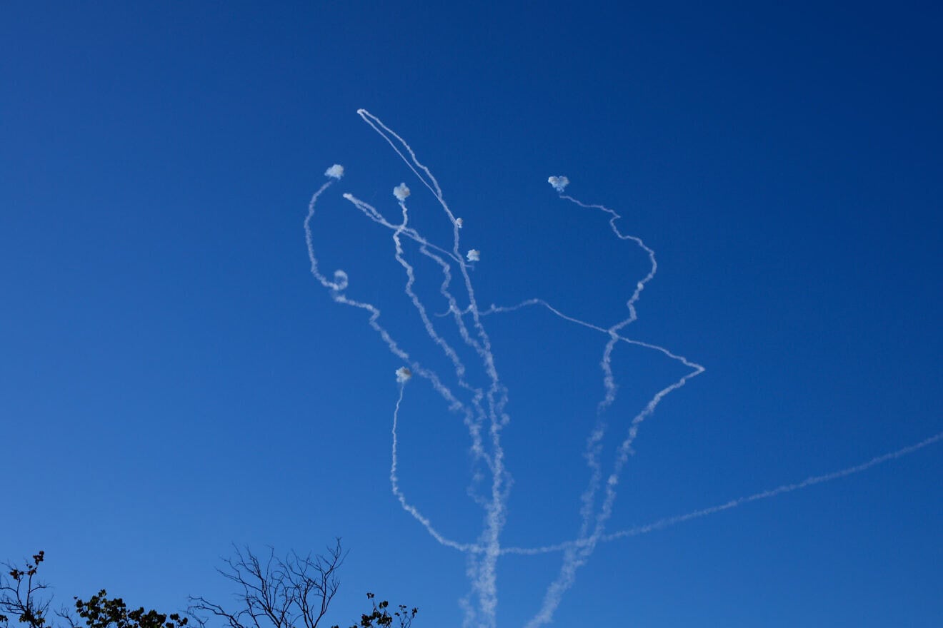 An Israeli anti-missile system intercept rockets fired from Lebanon, above the Naftali Mountains in northern Israel on Aug. 23, 2024. Photo by David Cohen/Flash90.