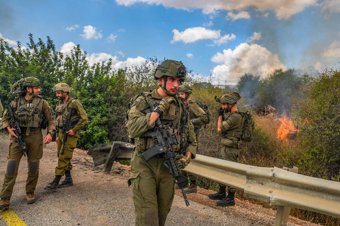 Israeli security forces at the scene where a missile fired from Lebanon hit an open area near the northern Israeli city of Kiryat Shmona, Sept. 4, 2024. Photo by Ayal Margolin/Flash90.