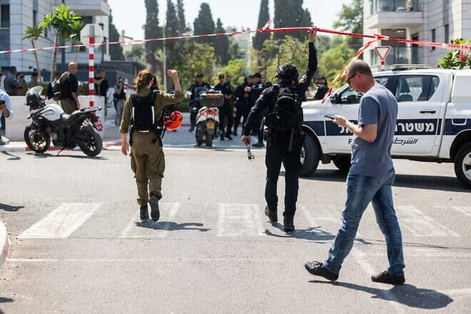 Security and rescue personnel at the site where a drone from Lebanon hit a building in Nahariya, Sept. 9, 2024. Credit: Flash90.