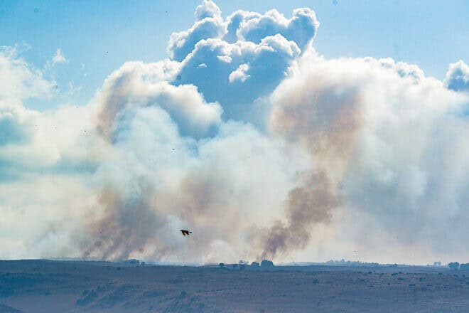 Smoke rises from a fire in the Golan Heights ignited by missiles fired from Lebanon, on Sept. 15, 2024. Photo by Ayal Margolin/Flash90.