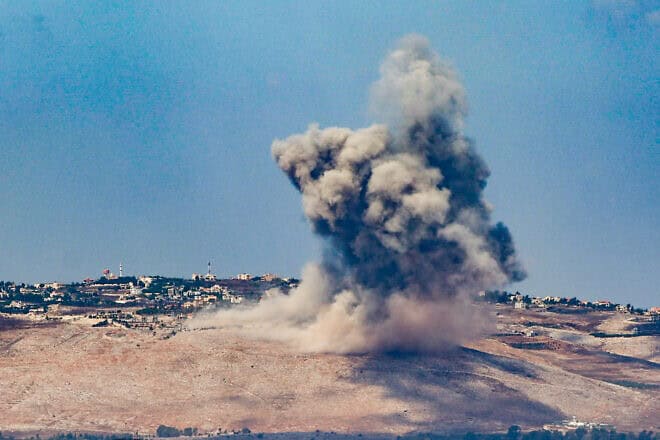 Smoke rises after an Israeli airstrike in Southern Lebanon, as seen from the Israeli side of the border, Sept. 23, 2024. Photo by David Cohen/Flash90.