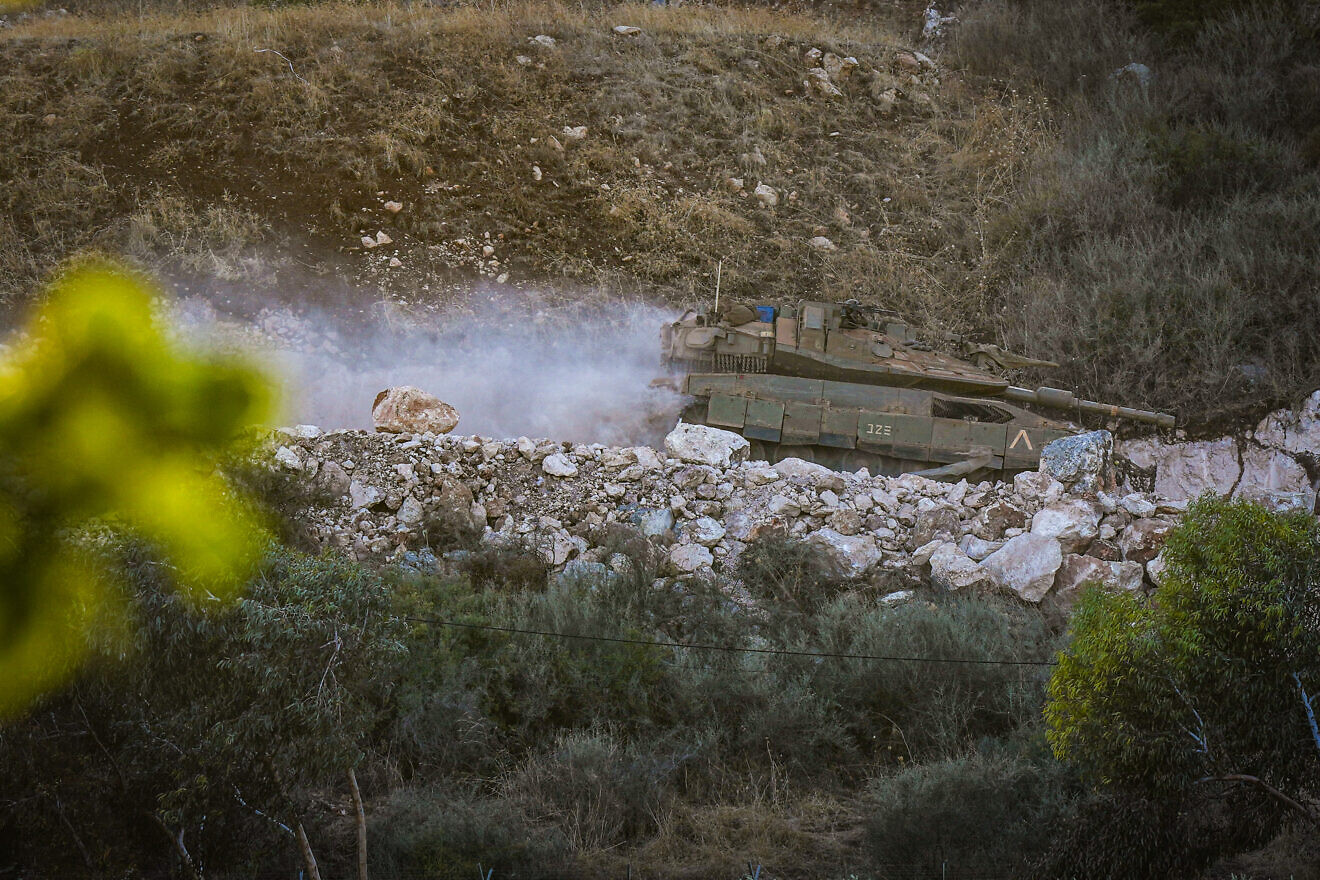 An Israeli tank patrols near the Israeli border with Lebanon, Sept. 30, 2024. Photo by Ayal Margolin/Flash90.