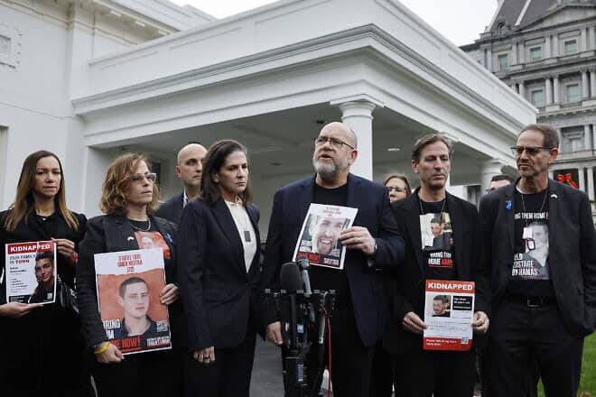 Family members of Americans who were taken hostage by Hamas during the terrorist attacks in Israel on Oct. 7, including (from left) Yael Alexander, Orna Neutra, Adi Alexander, Liz Naftali, Jonathan Dekel-Chen, Ruby Chen and Ronen Neutra, talk to reporters outside the West Wing of the White House on Dec. 13, 2023. Photo by Chip Somodevilla/Getty Images.