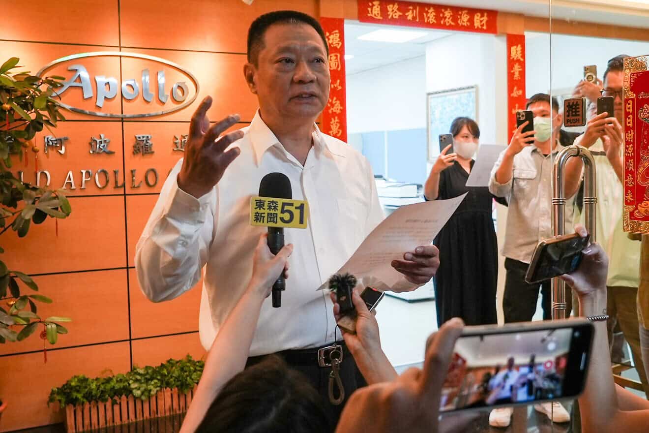 Hsu Ching-kuang (L), head of Taiwanese company Gold Apollo, speaks to the media outside the company's office in New Taipei City on Sept. 18, 2024. Photo by Yan Zhao/AFP via Getty Images.
