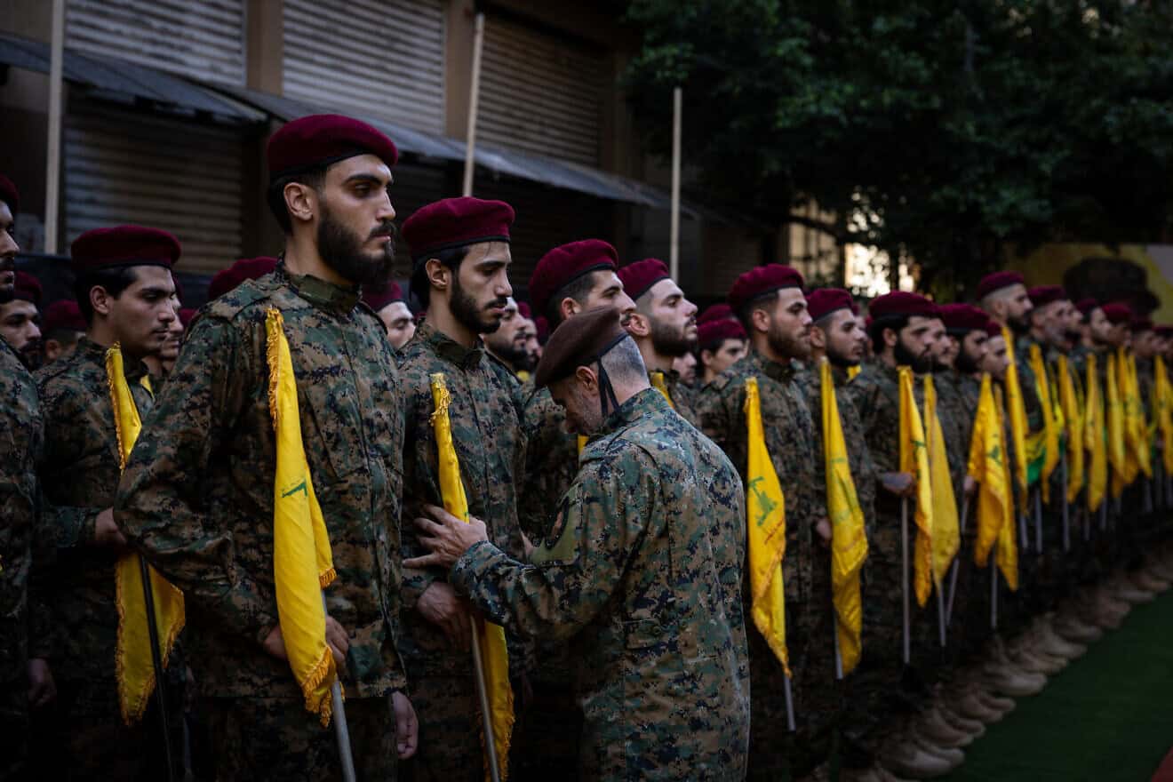 Hezbollah terrorists at the funeral of slain commander Ibrahim Aqil, Sept. 22, 2024. Photo by Oliver Marsden/Middle East Images/AFP via Getty Images.