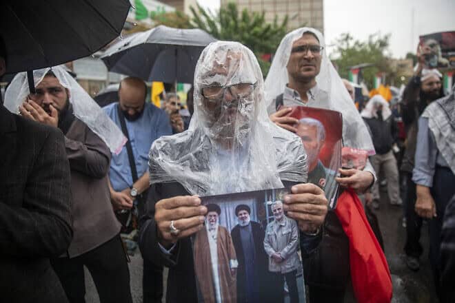 Iranians protest with anti-Israeli and anti-American slogans while participating in a protest rally to condemn the Israeli airstrike in Lebanon that killed Hassan Nasrallah and several Hezbollah commanders in Tehran, Iran,on Sept. 28, 2024 in Tehran, Iran. Photo by Majid Saeedi/Getty Images.
