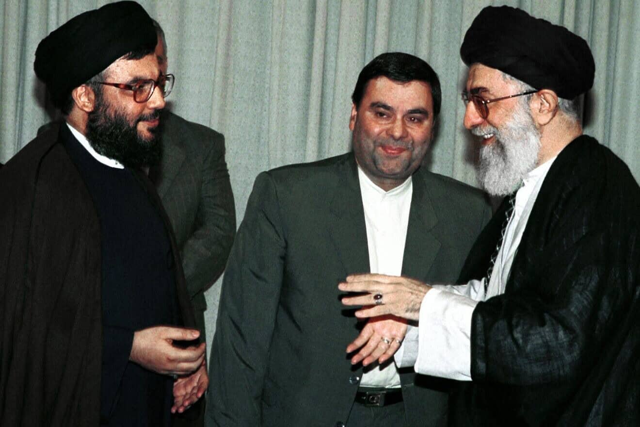 Iran's Supreme Leader Ayatollah Ali Khamenei (right) welcomes Hezbollah Secretary-General Hassan Nasrallah at his office in Tehran on July 4, 2000. Photo by Atta Kenare/AFP via Getty Images.