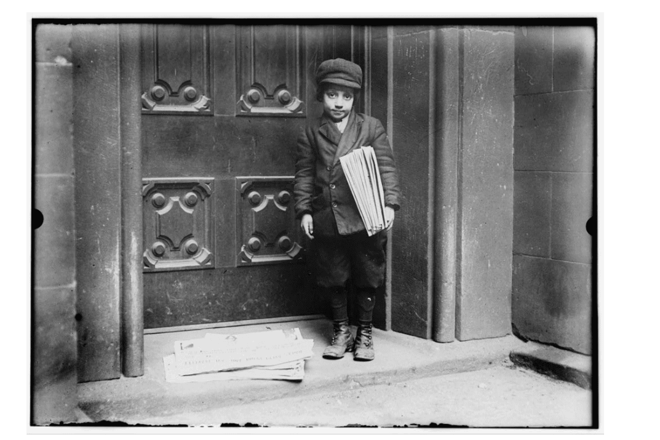 Newsboy in the United States, circa 1913. Photo by Lewis Wickes Hine, part of the Prints & Photographs Online Catalog at the Library of Congress.