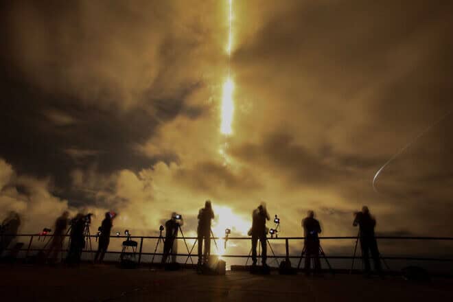A slow shutter speed captures a streak of light from the engines on SpaceX's Polaris Dawn Falcon 9 rocket as it blasts off from Launch Complex 39A of NASA's Kennedy Space Center in Cape Canaveral, Florida, on Sept. 10, 2024. Photo by Joe Raedle/Getty Images.
