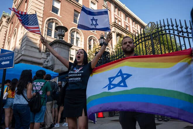 Pro-Israel activists gather in front of Columbia University to hold an "Unmask Campus Hate" protest at the start of the academic year in New York City on on August 27, 2024. Photo by Spencer Platt/Getty Images.
