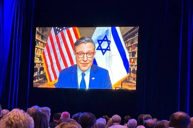 Speaker of the House Mike Johnson (R-La.) addresses attendees at the RJC Annual Leadership Summit in Las Vegas via satellite from Italy, Sept. 5, 2024. Photo by Izzy Salant.