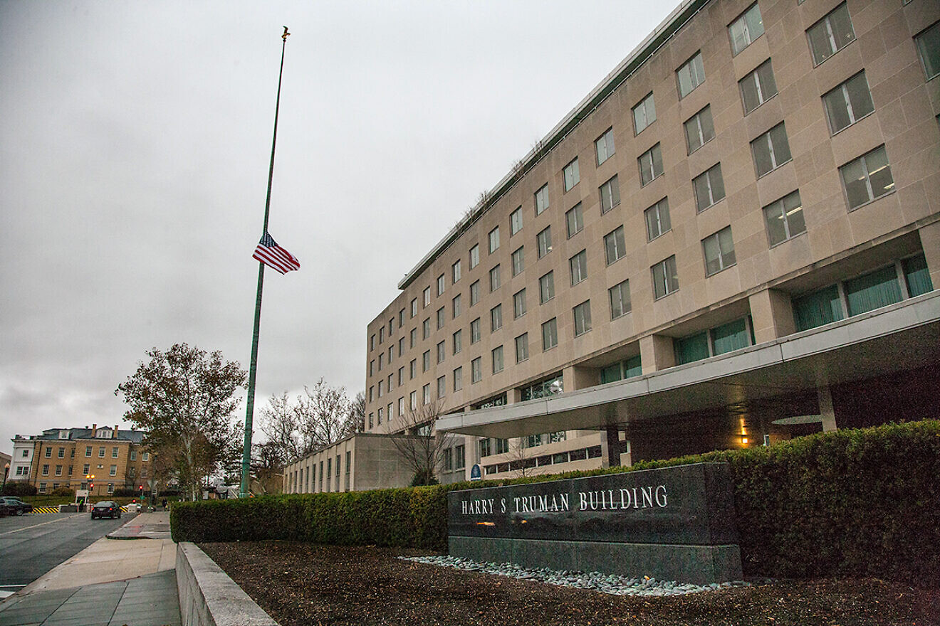 The U.S. State Department flag flies at half-mast to honor former South African President Nelson Mandela, on Dec. 6, 2013. Credit: U.S. State Department.
