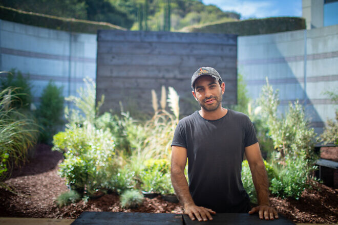 Jonathan York amid his installation “Force Majeure” at the Skirball Cultural Center in Los Angeles in October 2024. Credit: Courtesy.