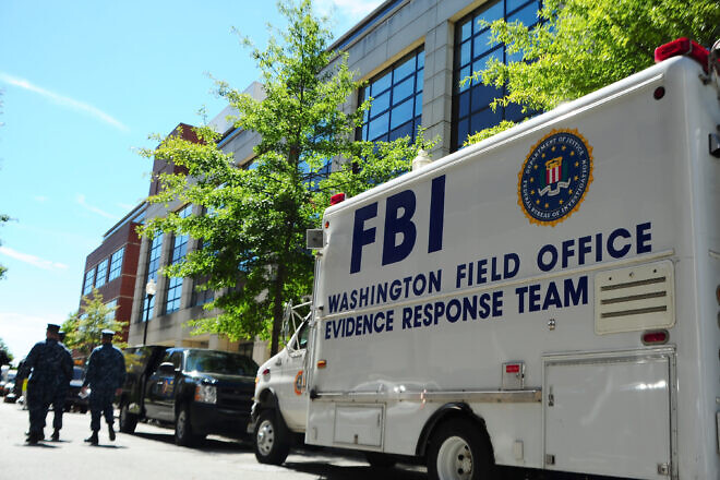 An FBI response team collects evidence at the Washington Navy Yard in the U.S. capital on Sept. 18, 2013. Credit: Mass Communication Specialist 2nd Class Pedro A. Rodriguez/U.S. Navy Photo.